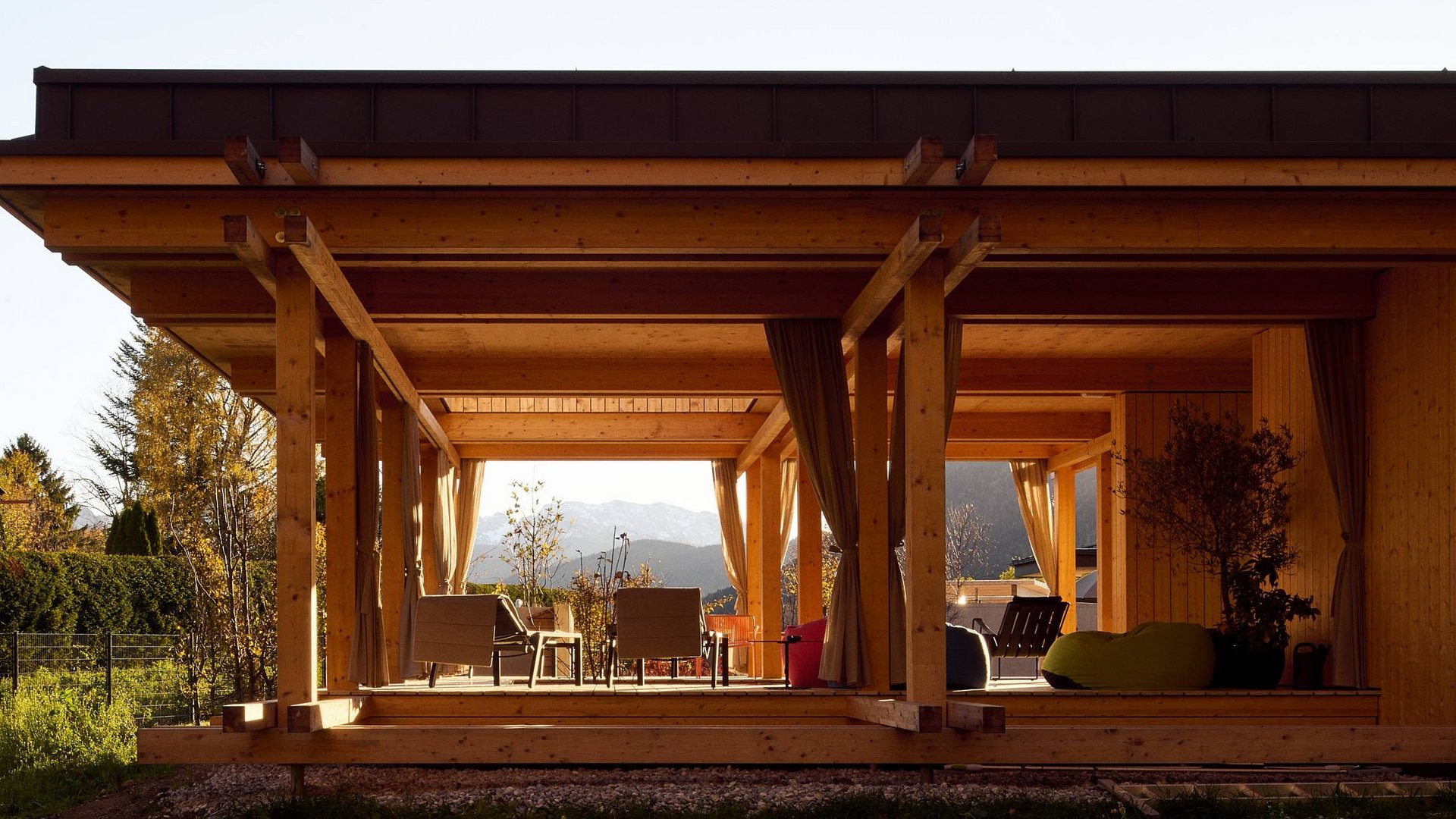 Hotel BERGEBLICK in Bavaria Modern wooden pavilion with seating area and mountain view in the background