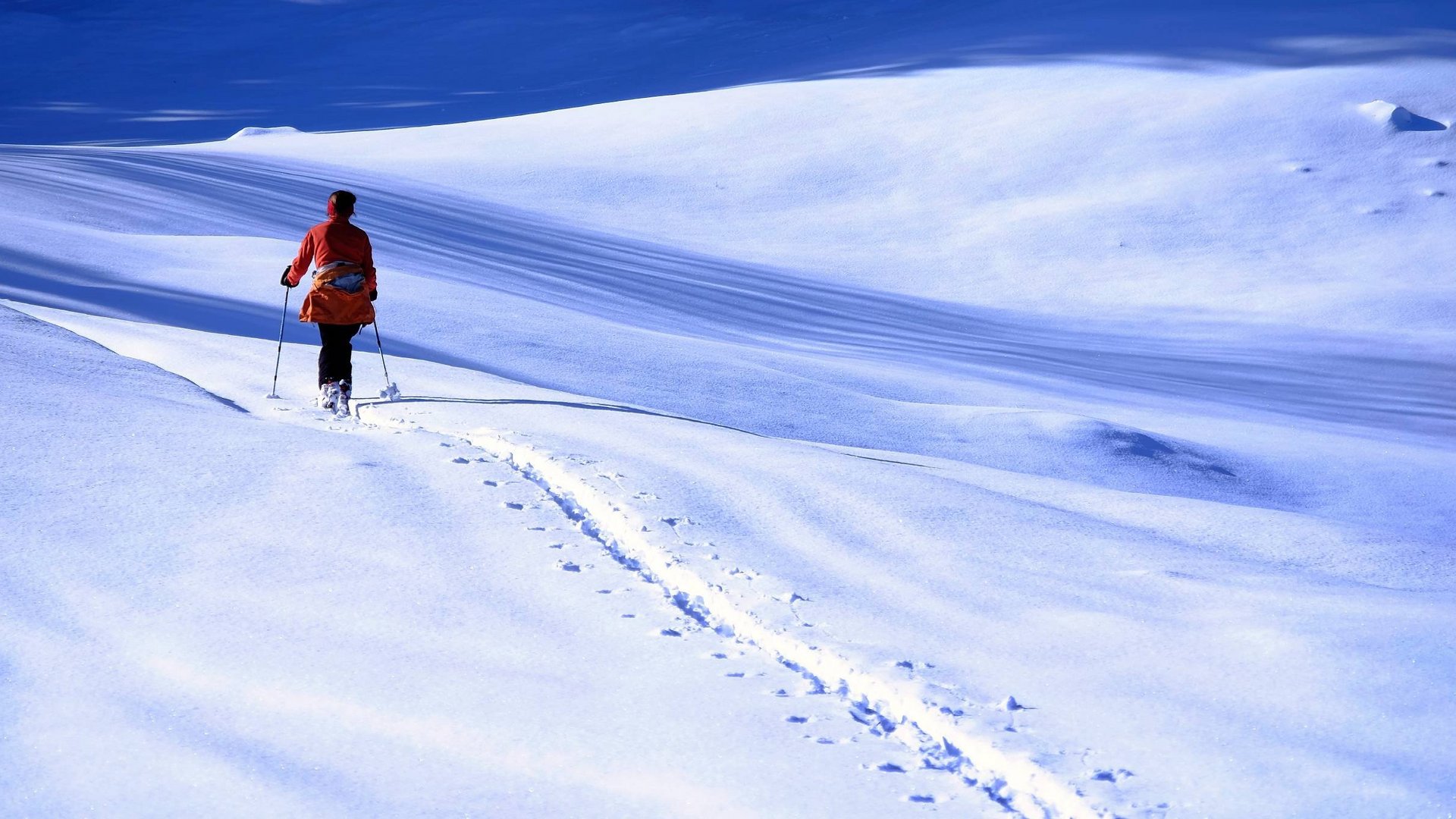 Winter bliss in Bad Tölz Person cross-country skiing on snowy terrain with ski poles
